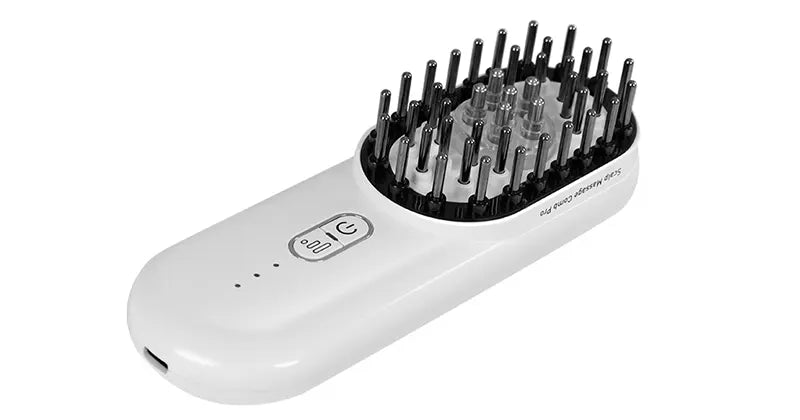 White light therapy massage comb with black bristle head on a white background