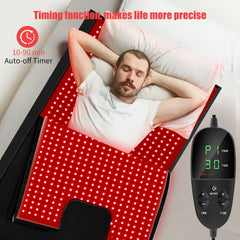 Person lying on a red LED bag with an auto-off timer next to them.